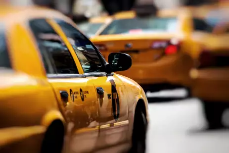 Close-up of yellow taxi cabs in New York City